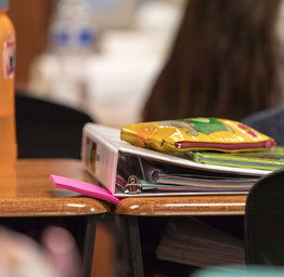 Binder on desk
