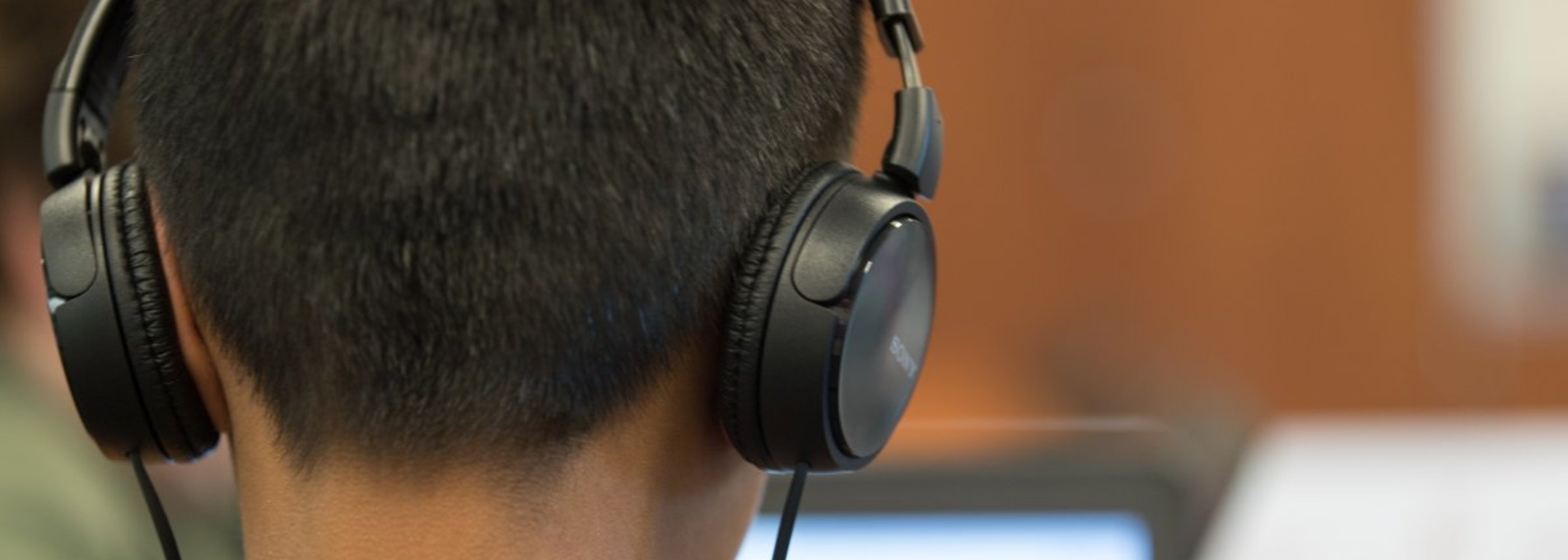 Student with Headphones